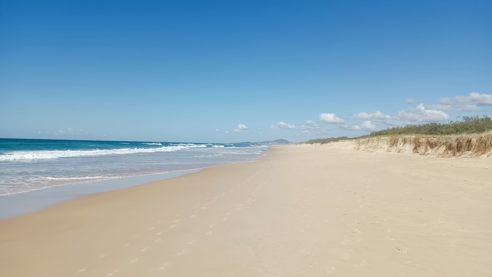 Foto de Marcus Beach con arena fina beige superficie