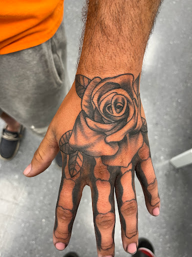 Find harley quinn and poison ivy tattoo ideas for your next unique tattoo in La Vista at InkedUp Needles