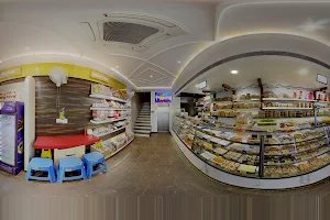 Shri Radhe Sweets Cakes savouries & Veg. Restaurant image