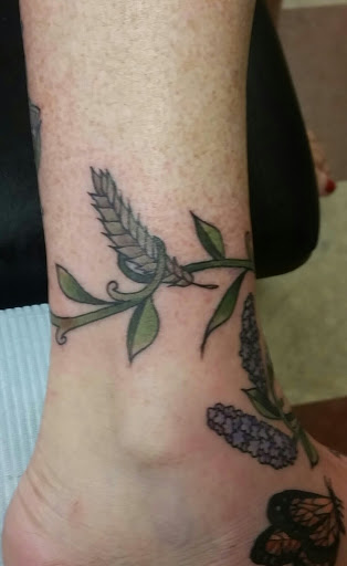 Explore mens simple tattoo ideas, creative tattoo ideas in Erie, available at Wayward Tattoo Studio