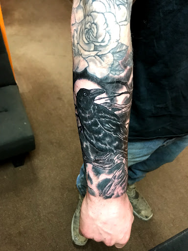 Explore compass tattoo ideas for men, creative tattoo ideas in Aurora, available at Ronin Tattoo Studio INC