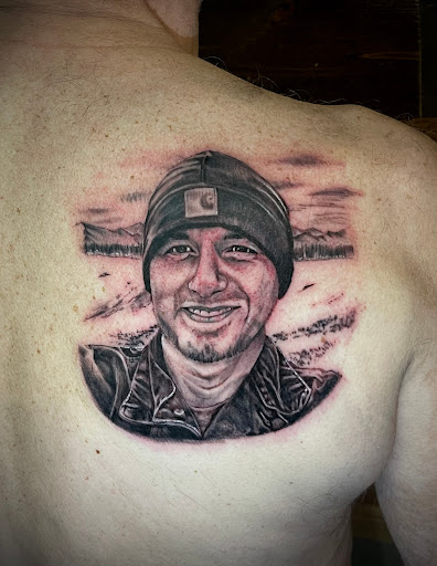 Explore mens religious tattoo ideas, creative tattoo ideas in Talbott, available at Alpha Tattoo co.