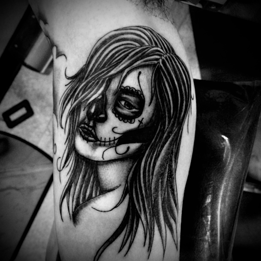 Explore greek tattoo ideas for men, creative tattoo ideas in Denison, available at Crossroads Tattoo Studio
