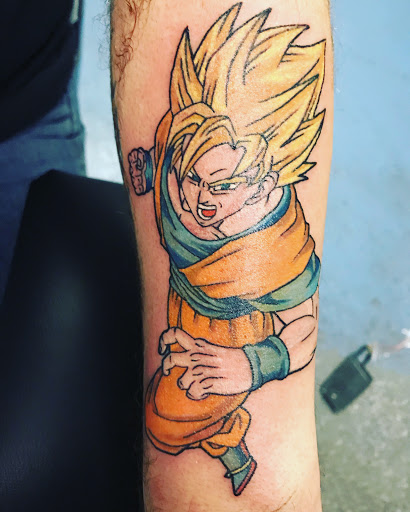 Explore flower spine tattoo ideas, creative tattoo ideas in Muncie, available at The Tattoo Studio