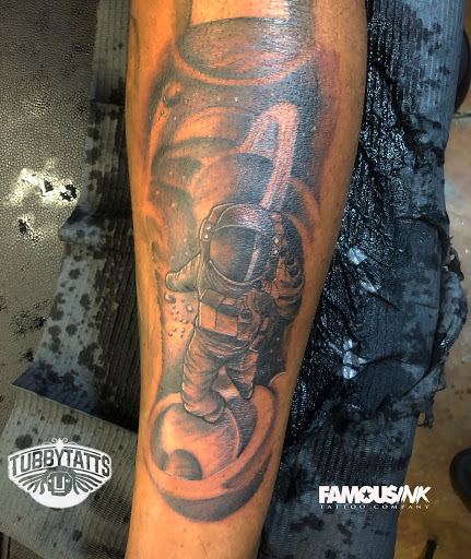 Explore arm shoulder tattoo ideas, creative tattoo ideas in Hammond, available at Famous Ink, Inc.