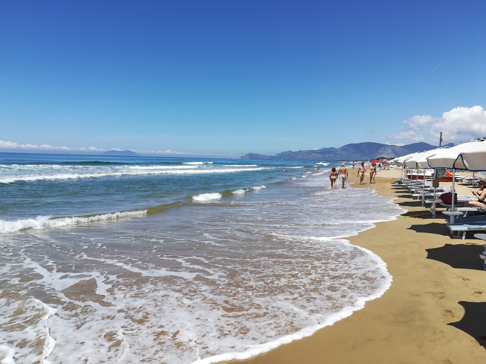 Foto af Spiaggia di Sperlonga med fin brunt sand overflade