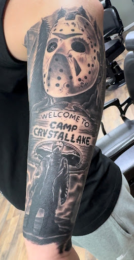 Explore cartoon tattoo ideas for men, creative tattoo ideas in Vincennes, available at Silver Owl Tattoo