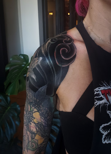 Explore skull tattoo ideas for women, creative tattoo ideas in Pocatello, available at Tattoos by Cherise