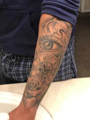 Explore broken clock tattoo ideas, creative tattoo ideas in Arlington, available at Urbans Tattoo & Piercing Studio