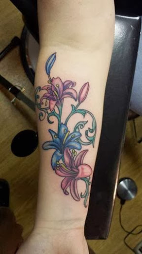 Explore warhammer 40k tattoo ideas, creative tattoo ideas in Charlottesville, available at Mystic Tattoo and Body Piercing