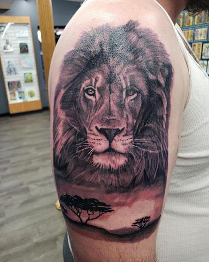 Explore family tree tattoo ideas for men, creative tattoo ideas in Greenfield, available at Garden of Eden Tattoos