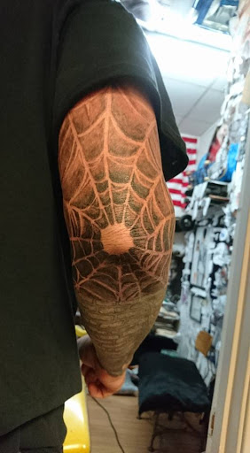 Explore beagle tattoo ideas, creative tattoo ideas in Jonesboro, available at Immortal Ink