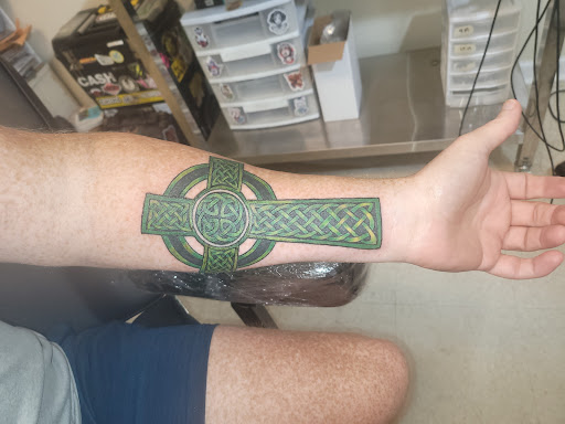 Explore tattoo ideas for a dad, creative tattoo ideas in Ozark, available at Tooth & Nail Tattoo & Piercing