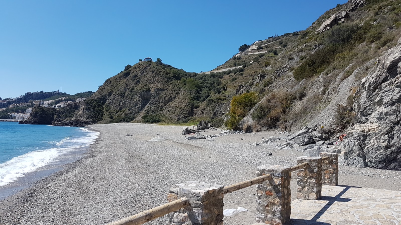 Foto af Playa el Muerto med grå fin sten overflade