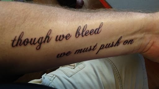 Explore minimalist cat tattoo ideas, creative tattoo ideas in Springfield, available at Way of Ink