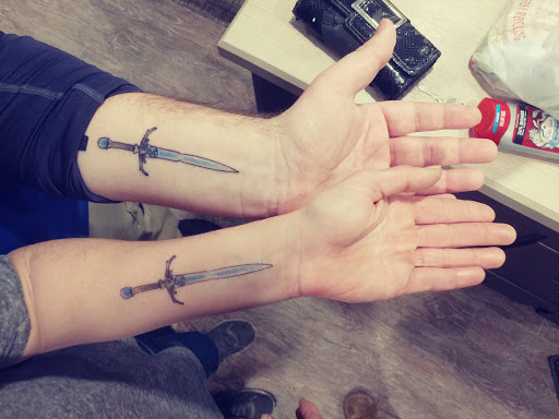 Explore black and grey half sleeve tattoo ideas, creative tattoo ideas in Grand Island, available at Smokin Joes Tattoo