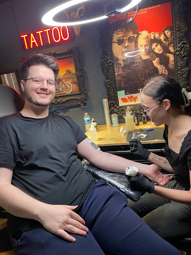 Explore arm cross tattoo ideas, creative tattoo ideas in Clovis, available at High Sierra Tattoo Co.