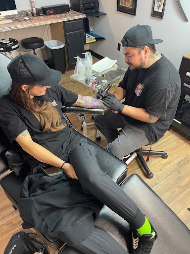 Explore throat tattoo ideas for females, creative tattoo ideas in Whitehall, available at Grumble Bunny Tattoo Company