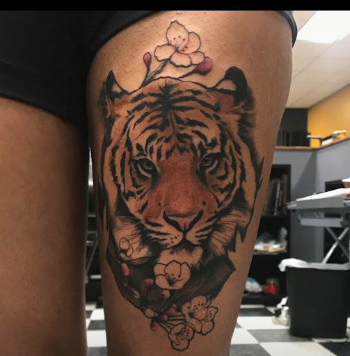 Explore marriage ring tattoo ideas, creative tattoo ideas in Stevens Point, available at Black Rabbit Tattooing