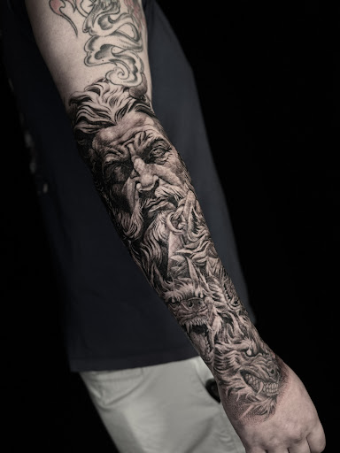 Explore tribal back tattoo ideas, creative tattoo ideas in Norcross, available at Brotherhood Tattoo