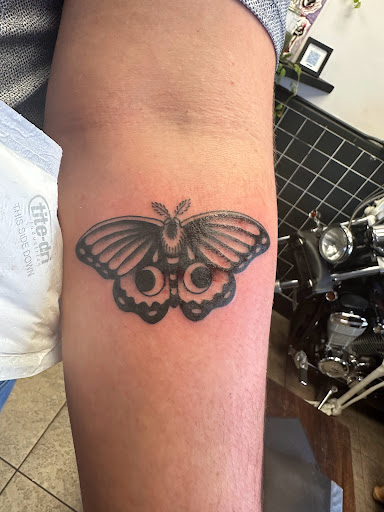 Explore side tattoo ideas for women, creative tattoo ideas in New Orleans, available at TOUGH LOVE TATTOOS