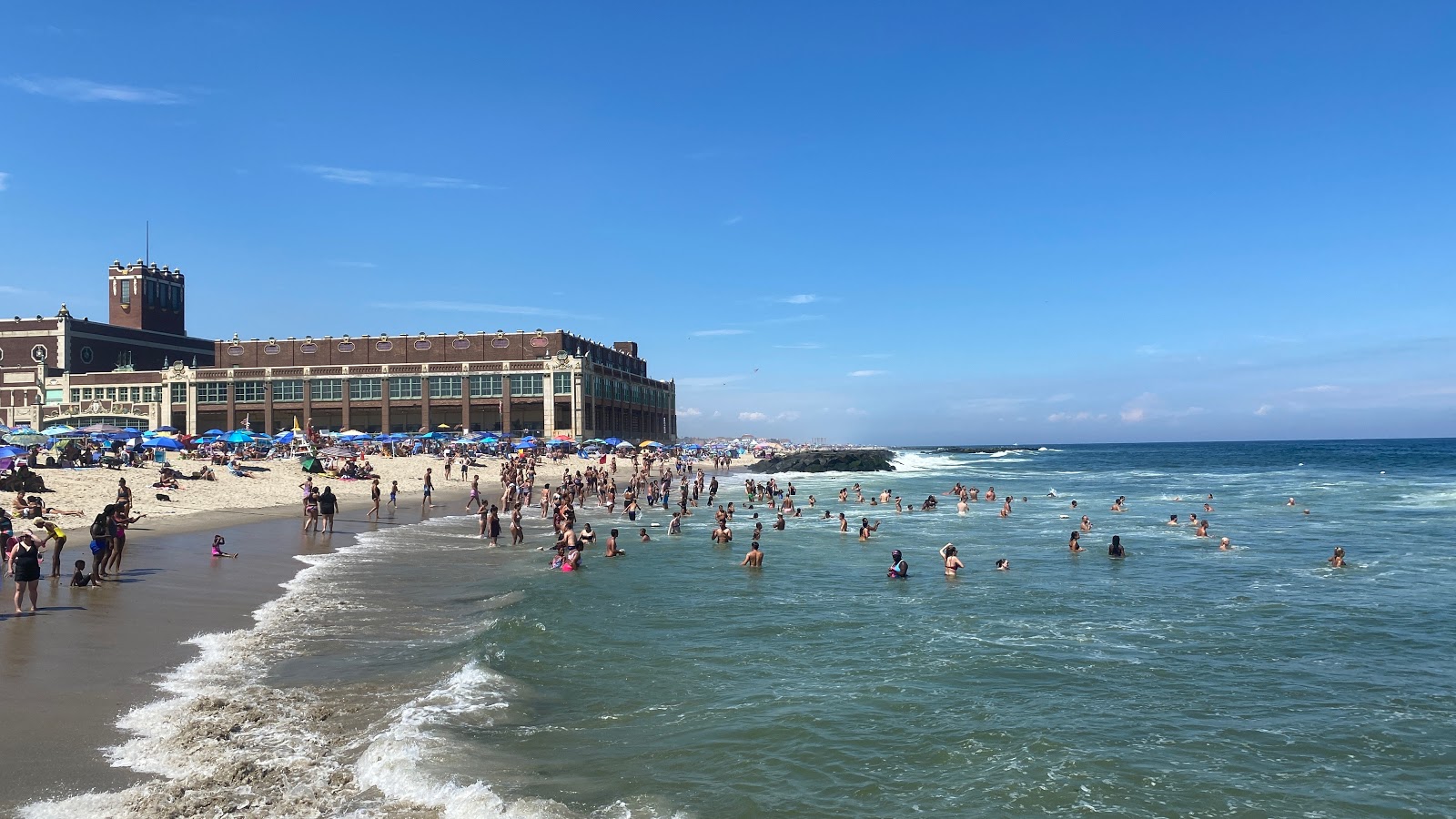 Photo of Asbury Park Beach with turquoise pure water surface