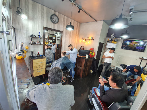 EE'GLIO BARBER SHOP