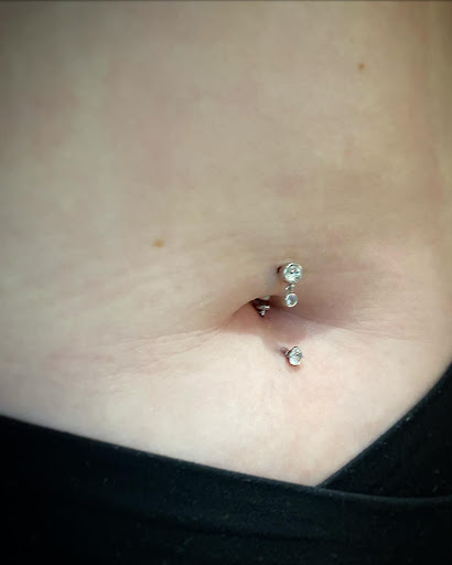 Explore mens chest tattoo ideas small, creative tattoo ideas in Cary, available at Fine Art Body Piercing By Lilith Mae