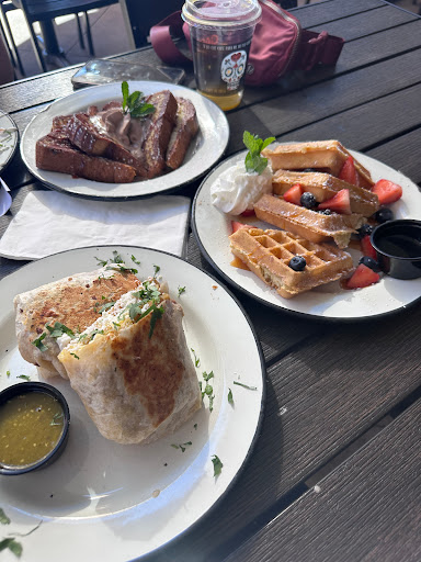 French toast with cajeta, churro waffle, and chilaquiles verde burrito 