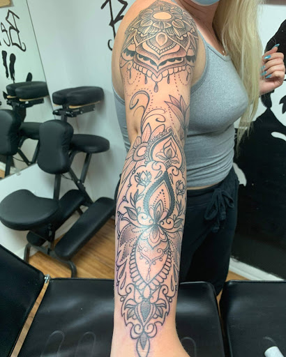 Explore forearm watercolor tattoo ideas, creative tattoo ideas in Owosso, available at Expressions Body Art Studio