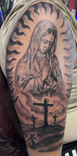 Explore fly fishing tattoo ideas, creative tattoo ideas in Albuquerque, available at A Touch of Ink Tattoo & Art Gallery