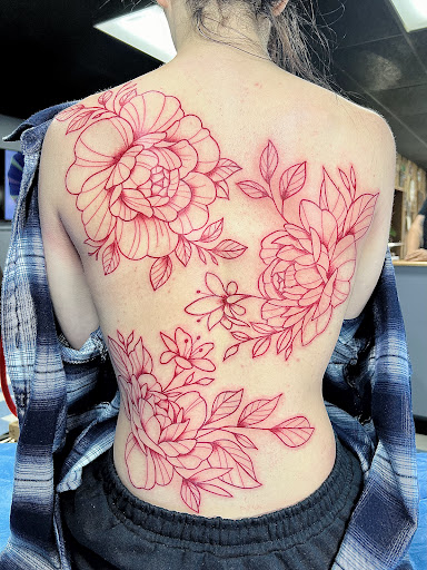 Explore spine tattoo ideas, creative tattoo ideas in Elkin, available at Black Bear Tattoo