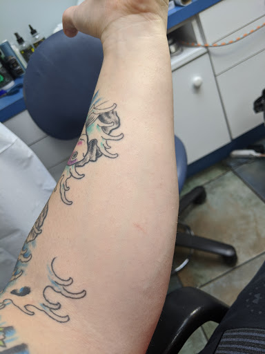 Explore tattoo sleeve filler ideas for a man, creative tattoo ideas in Glen Burnie, available at Dragon Moon Tattoo Studio Inc