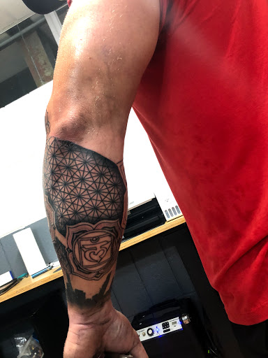 Explore calf tattoo ideas men, creative tattoo ideas in Sarasota, available at SEVEN SINS Tattoo Studio