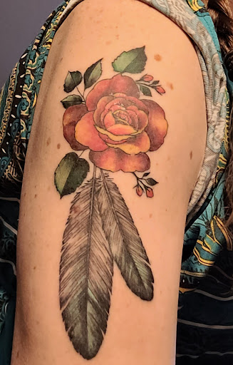 Explore butterfly flower tattoo ideas, creative tattoo ideas in Saint Paul, available at Gabriels Fallen Angel Tattoo Studio