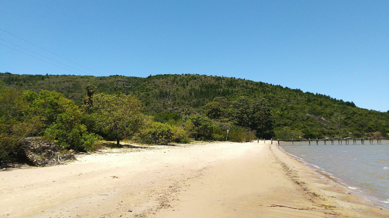 Fotografie cu Praia da Pedreira cu o suprafață de apa turcoaz