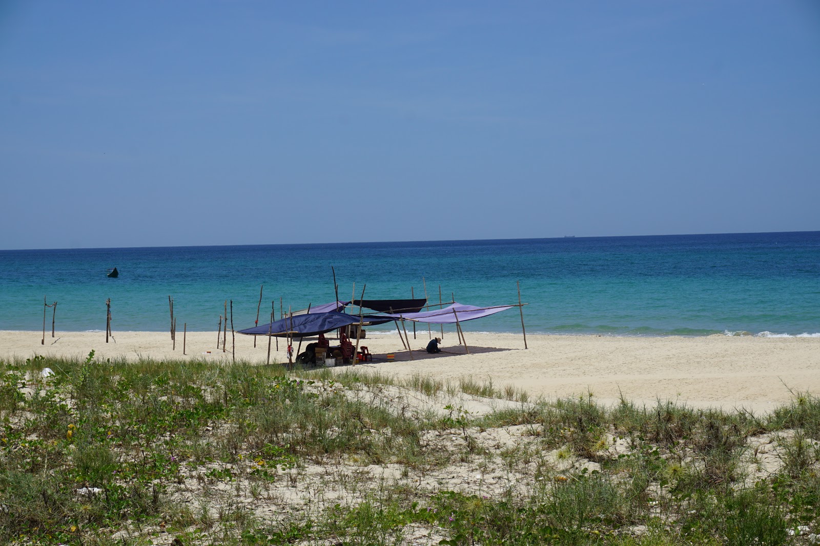 Tinh Thuy Beach的照片 带有碧绿色水表面