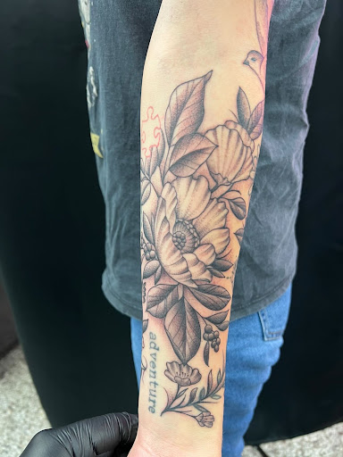 Find space tattoo ideas for your next unique tattoo in Sanford at Luv Ink