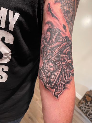 Explore lion family tattoo ideas, creative tattoo ideas in Elko, available at Freedom Tattoo