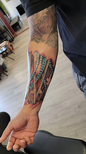 Explore fire and air tattoo ideas, creative tattoo ideas in Kalispell, available at Swindler Ink