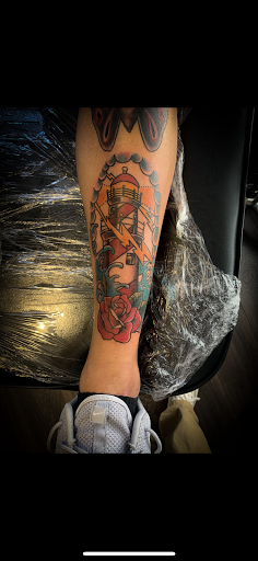 Explore tattoo ideas for black men, creative tattoo ideas in Warrensburg, available at Altered Visions Tattoo Studio