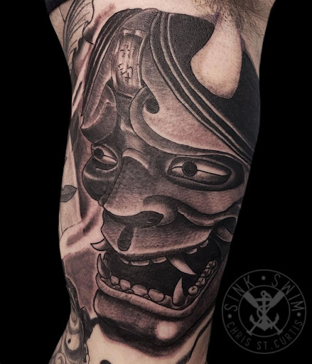 Explore killmonger tattoo ideas, creative tattoo ideas in Marietta, available at Sink or Swim Studio and Gallery