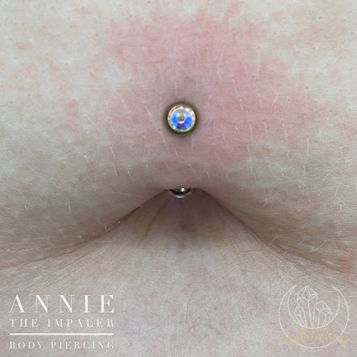 Find between the boob tattoo ideas for your next unique tattoo in Bloomington at Crystal Moon Body Arts