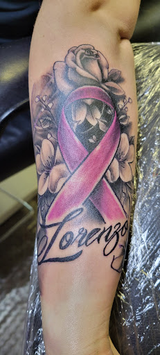 Explore haunted house tattoo ideas, creative tattoo ideas in Angola, available at Hoodlum Ink