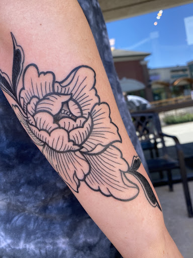 Explore cool dragon tattoo ideas, creative tattoo ideas in Omaha, available at Ironwood Ink