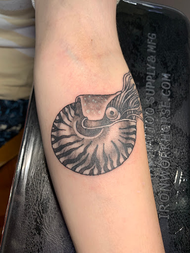 Explore handcuff tattoo ideas, creative tattoo ideas in Golden, available at Allegoric Art