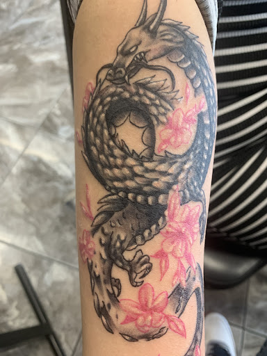 Explore mermaid tattoo ideas for females, creative tattoo ideas in Conroe, available at Monsters Ink, LLC