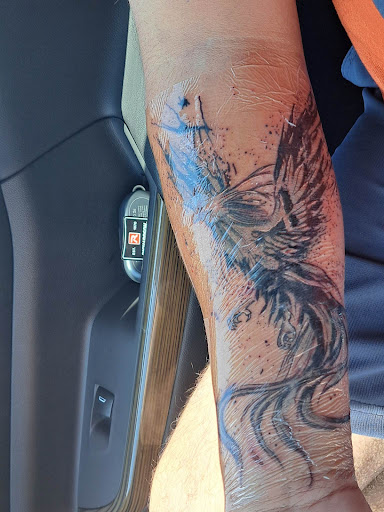 Explore cover up ideas for name tattoos, creative tattoo ideas in East Dublin, available at Georgia Boyz Ink Works