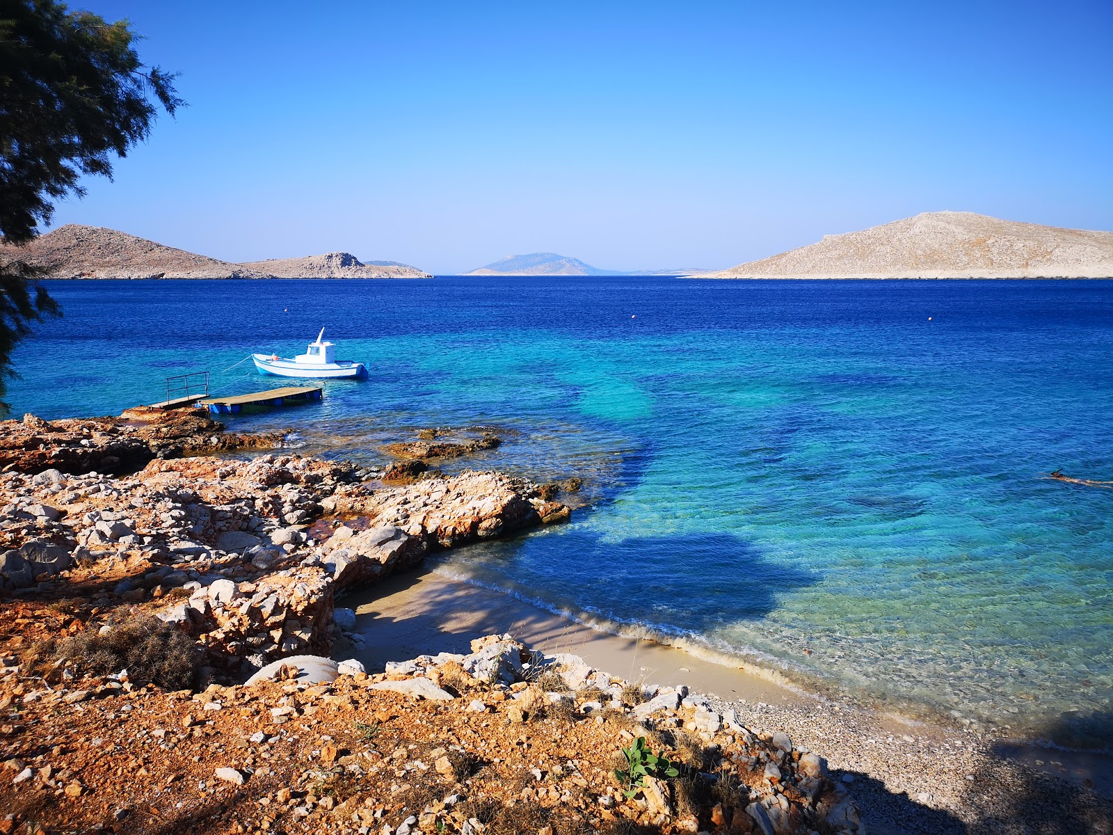 Photo of Ftenagia Beach with turquoise pure water surface