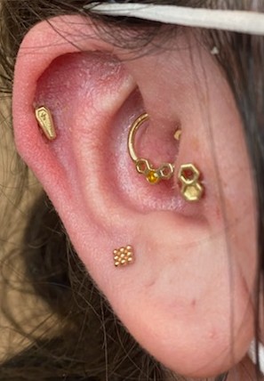 Explore dragon ball tattoo ideas, creative tattoo ideas in Denver, available at IRIS Piercing Studio and Jewelry Gallery